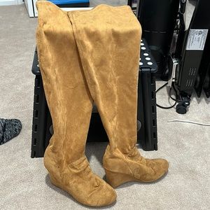 Knee high boots used look new